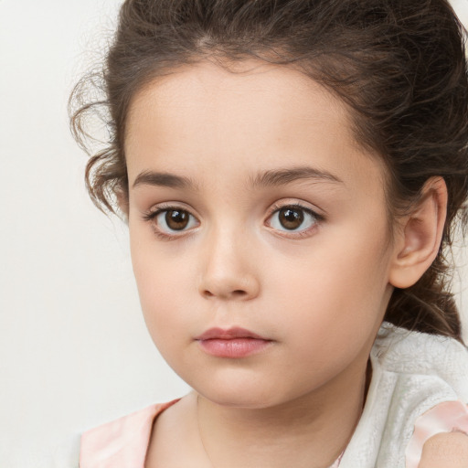 Neutral white child female with medium  brown hair and brown eyes