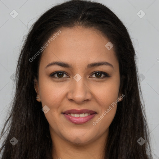 Joyful latino young-adult female with long  brown hair and brown eyes