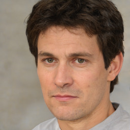 Neutral white adult male with short  brown hair and brown eyes