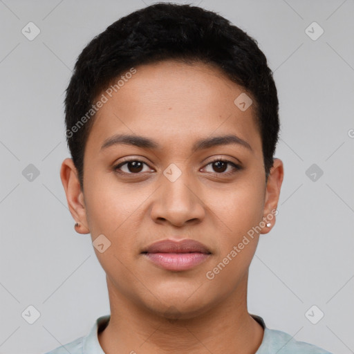 Joyful latino young-adult female with short  black hair and brown eyes