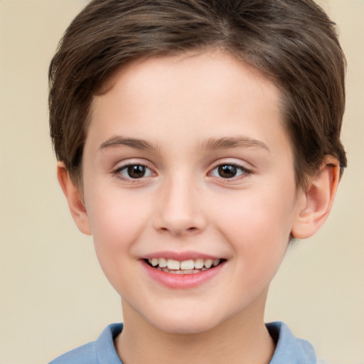 Joyful white child female with short  brown hair and brown eyes