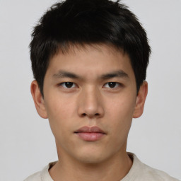 Neutral asian young-adult male with short  brown hair and brown eyes