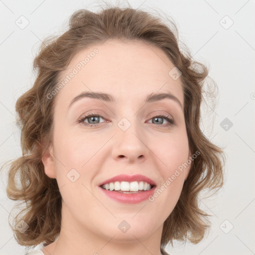 Joyful white young-adult female with medium  brown hair and green eyes