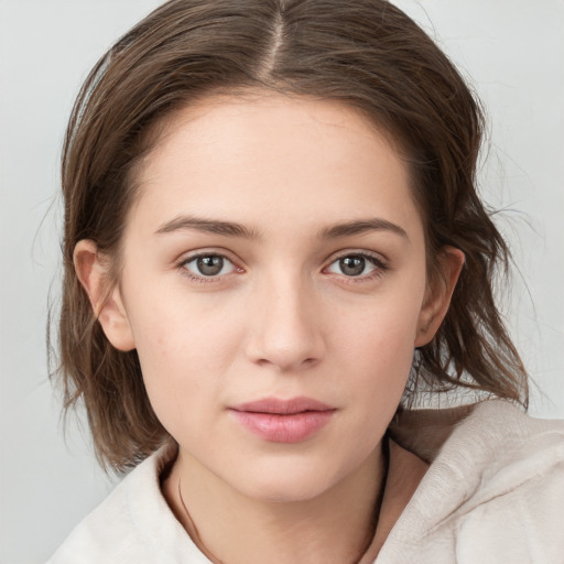 Neutral white young-adult female with medium  brown hair and grey eyes