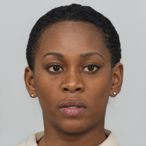 Neutral black young-adult female with short  brown hair and brown eyes