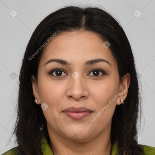 Joyful latino young-adult female with long  brown hair and brown eyes