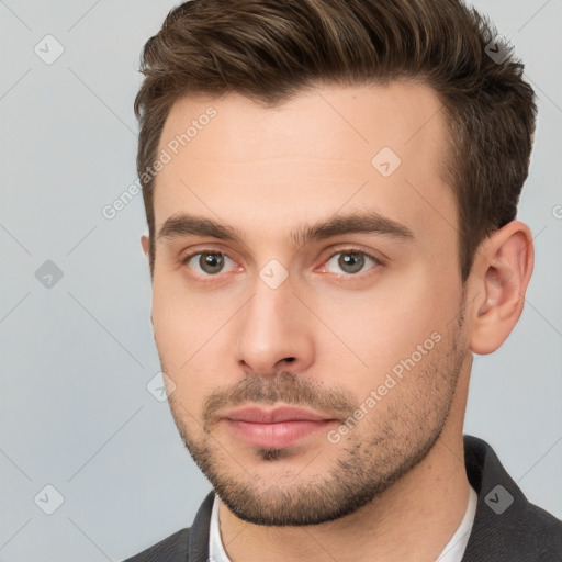 Neutral white young-adult male with short  brown hair and brown eyes