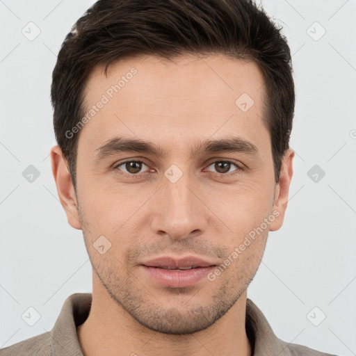 Joyful white young-adult male with short  brown hair and brown eyes