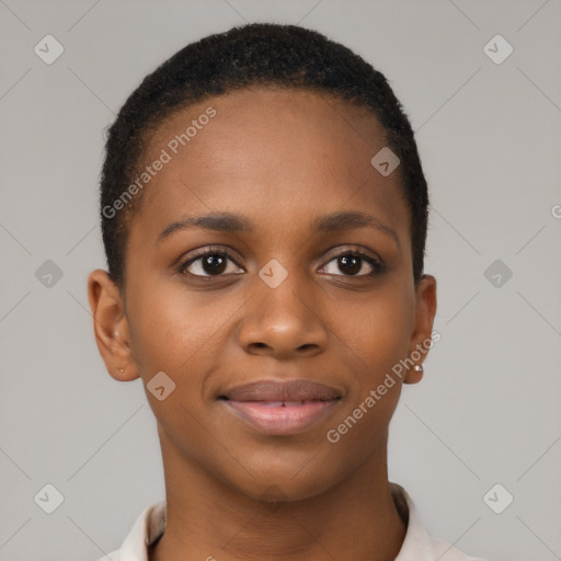 Joyful black young-adult female with short  black hair and brown eyes