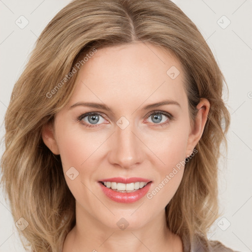 Joyful white young-adult female with long  brown hair and blue eyes