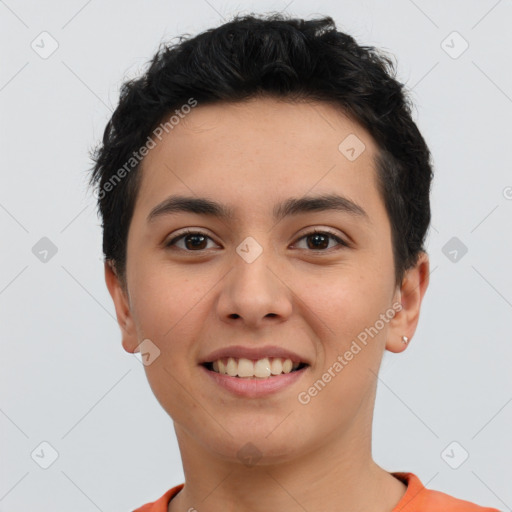 Joyful latino young-adult female with short  brown hair and brown eyes