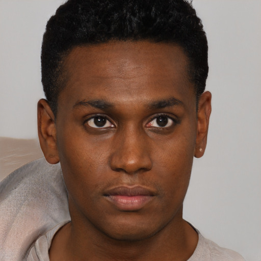 Neutral black young-adult male with short  brown hair and brown eyes