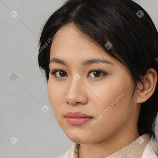 Neutral asian young-adult female with medium  black hair and brown eyes