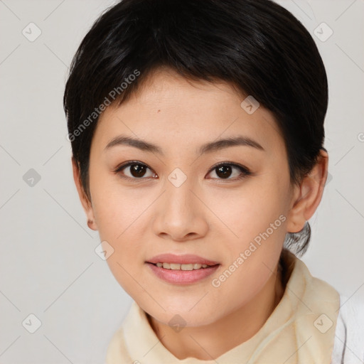 Joyful asian young-adult female with short  brown hair and brown eyes