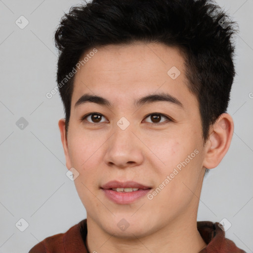 Joyful asian young-adult male with short  brown hair and brown eyes