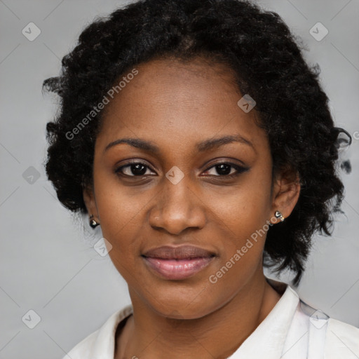 Joyful black young-adult female with long  black hair and brown eyes