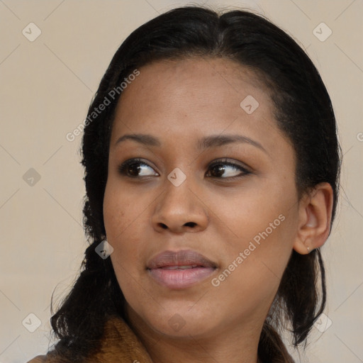 Joyful black young-adult female with medium  brown hair and brown eyes