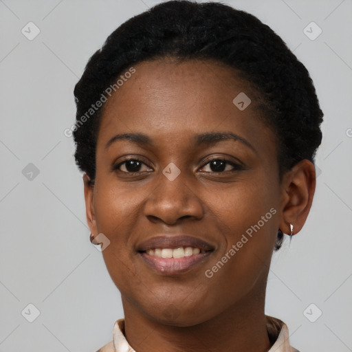 Joyful black young-adult female with short  black hair and brown eyes