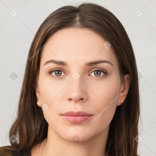 Neutral white young-adult female with long  brown hair and brown eyes