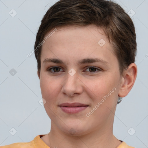 Joyful white young-adult female with short  brown hair and grey eyes