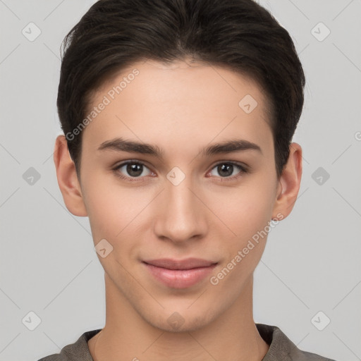 Joyful white young-adult female with short  brown hair and brown eyes