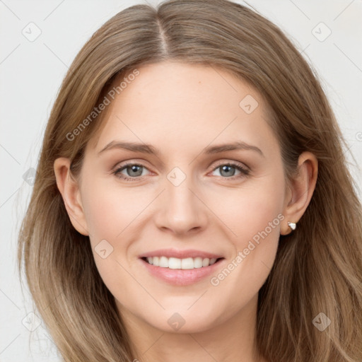 Joyful white young-adult female with long  brown hair and grey eyes