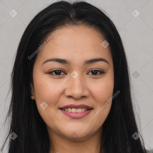 Joyful latino young-adult female with long  brown hair and brown eyes