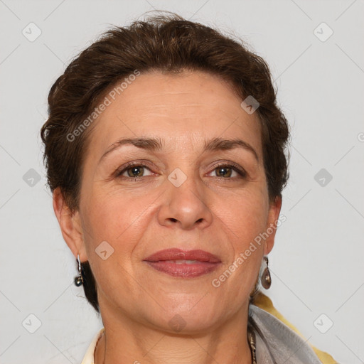 Joyful white adult female with short  brown hair and brown eyes