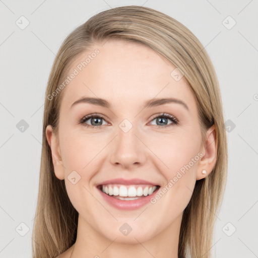 Joyful white young-adult female with long  brown hair and grey eyes