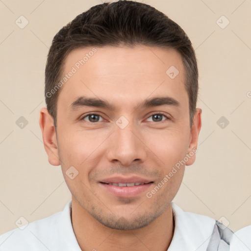 Joyful white young-adult male with short  brown hair and brown eyes