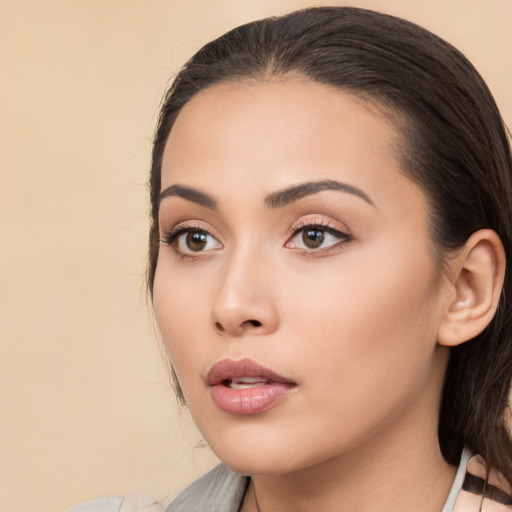 Neutral asian young-adult female with medium  brown hair and brown eyes