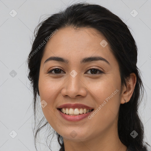 Joyful asian young-adult female with long  brown hair and brown eyes