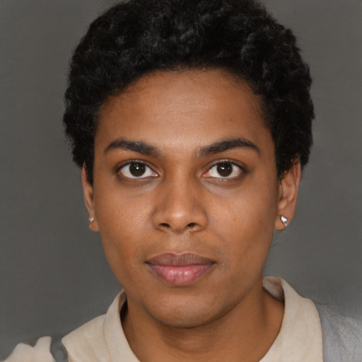 Neutral black young-adult female with short  black hair and brown eyes