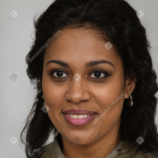 Joyful black young-adult female with long  brown hair and brown eyes