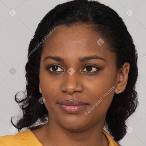 Joyful black young-adult female with medium  brown hair and brown eyes