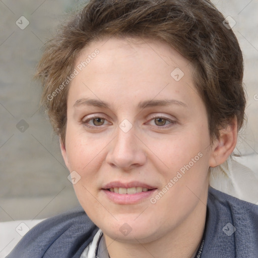 Joyful white adult female with medium  brown hair and grey eyes