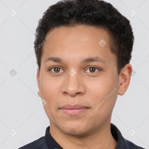 Neutral latino young-adult male with short  brown hair and brown eyes