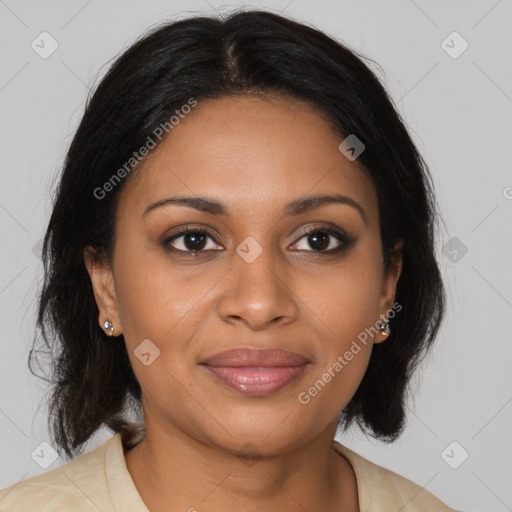 Joyful black young-adult female with medium  brown hair and brown eyes