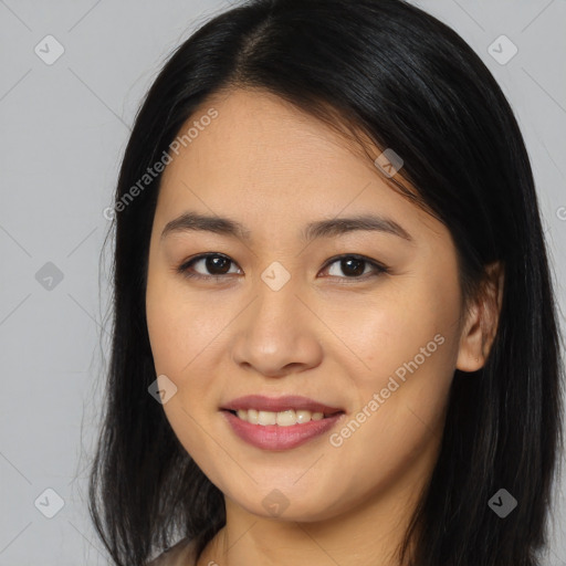 Joyful asian young-adult female with long  brown hair and brown eyes