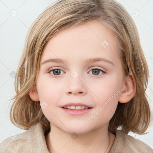 Joyful white child female with medium  brown hair and blue eyes