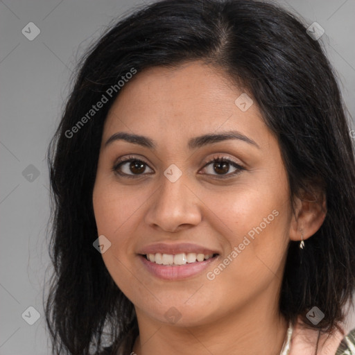 Joyful latino young-adult female with medium  brown hair and brown eyes