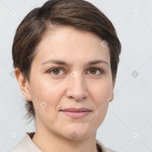 Joyful white adult female with short  brown hair and brown eyes