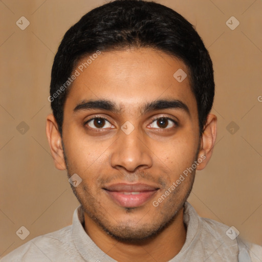 Joyful latino young-adult male with short  black hair and brown eyes