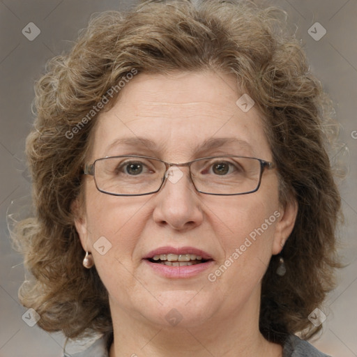 Joyful white middle-aged female with medium  brown hair and blue eyes