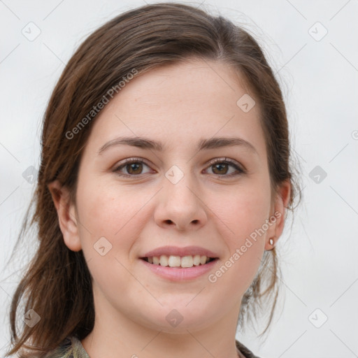 Joyful white young-adult female with medium  brown hair and grey eyes