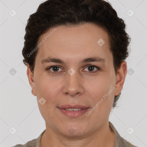 Joyful white adult female with short  brown hair and brown eyes