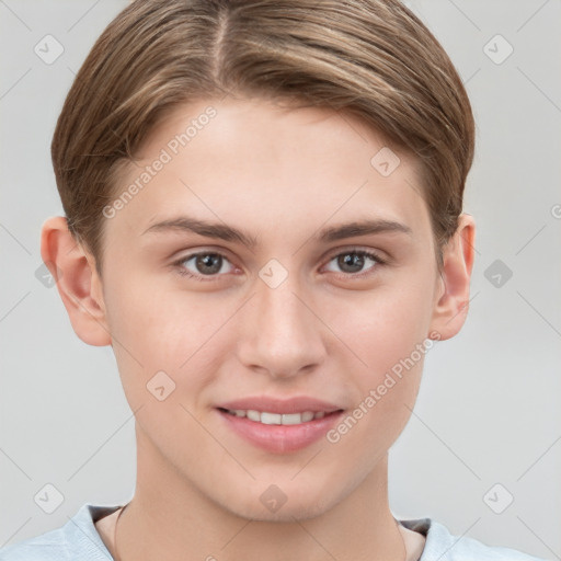 Joyful white young-adult female with short  brown hair and grey eyes