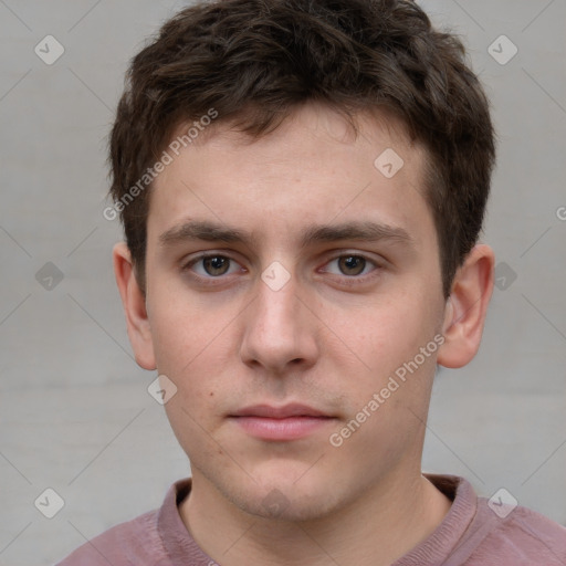 Neutral white young-adult male with short  brown hair and grey eyes