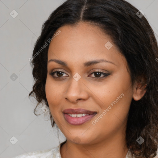 Joyful black young-adult female with medium  brown hair and brown eyes