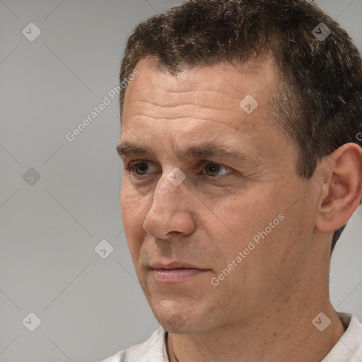 Neutral white adult male with short  brown hair and brown eyes